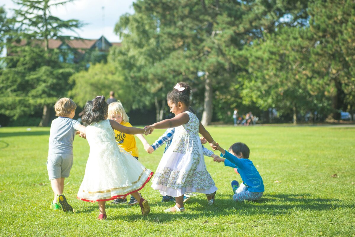 Children playing in a field together