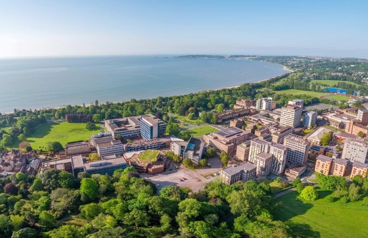 Swansea University campus from above looking out to the sea